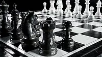 a MC Marble Cultures premium handmade marble chess set featuring high-contrast black and white stone pieces