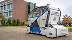 This image shows an autonomous shuttle bus developed for wheelchair accessibility at Western Michigan University.