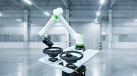 This is a FANUC CRX collaborative robot featuring a lightweight white design with bright green accents.