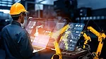the integration of human labor with advanced robotics and automation technologies