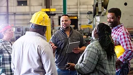 industrial workers in a factory setting