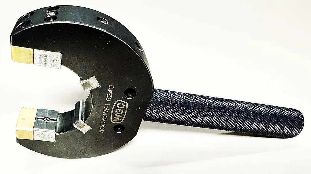 This tool is an adjustable snap gage used for high-speed inspection of external dimensions