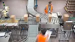 a warehouse conveyor system, likely utilized for sorting or packaging goods