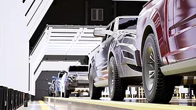 This image depicts a modern automotive manufacturing assembly line, likely focusing on quality control inspections for new pickup trucks