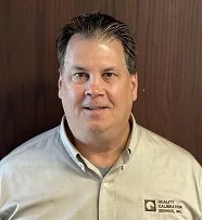 Head shot: William (B.J.) Hangartner, president of Quality Calibration Service Inc