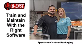 The Pereiras posing next to packaging equipment at Spectrum Custom Packaging
