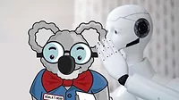 Robot whispers into the ear of Koala T. Bear